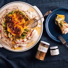 Gewürzhaus - Cardamom Pistachio Sugar - Cardamom Pistachio Pavlova with Rose Cream, Kiwifruit & Mango