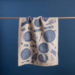 Gewürzhaus - tea towel with blue Eat, Drink, Dance design 