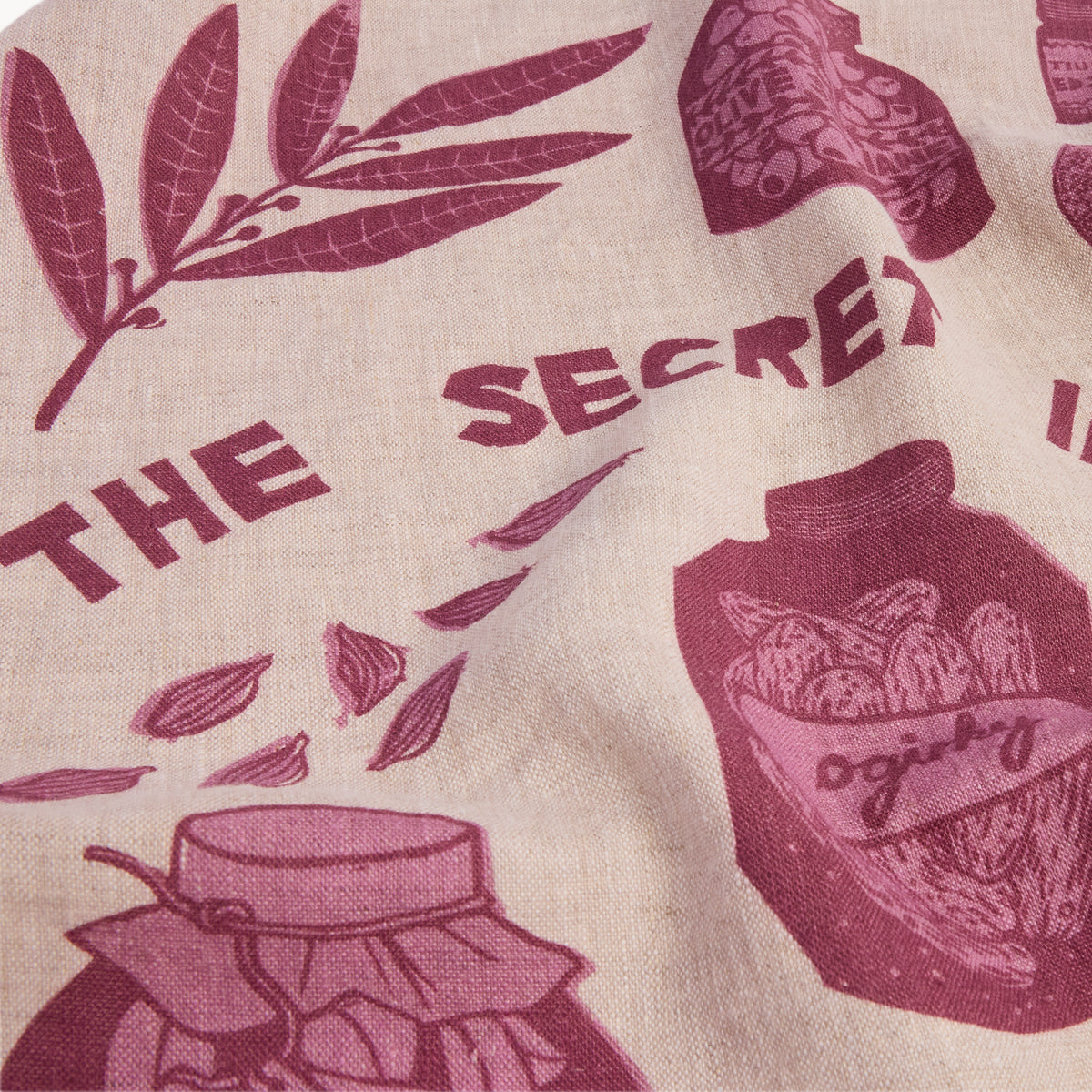 Gewürzhaus - Tea towel with purple secret ingredient design